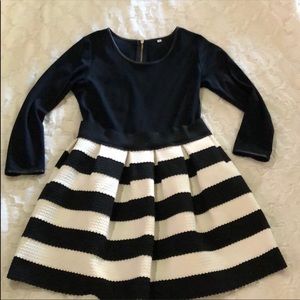 Black and white striped dress with leather trim